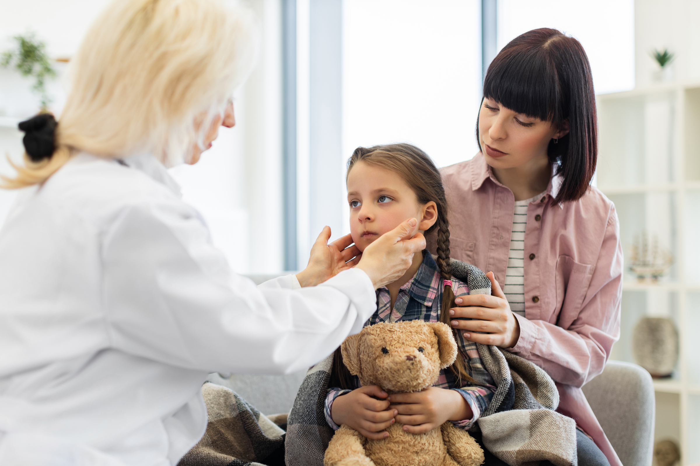 A New York business woman takes her daughter to the doctor, taking time off of work and risking retaliation from her employers.